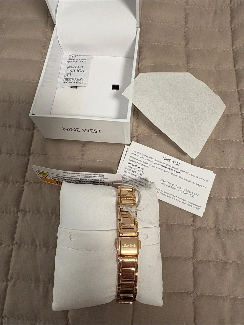 Nine West  Gold Bracelet Watch with Glitter Blue Dial